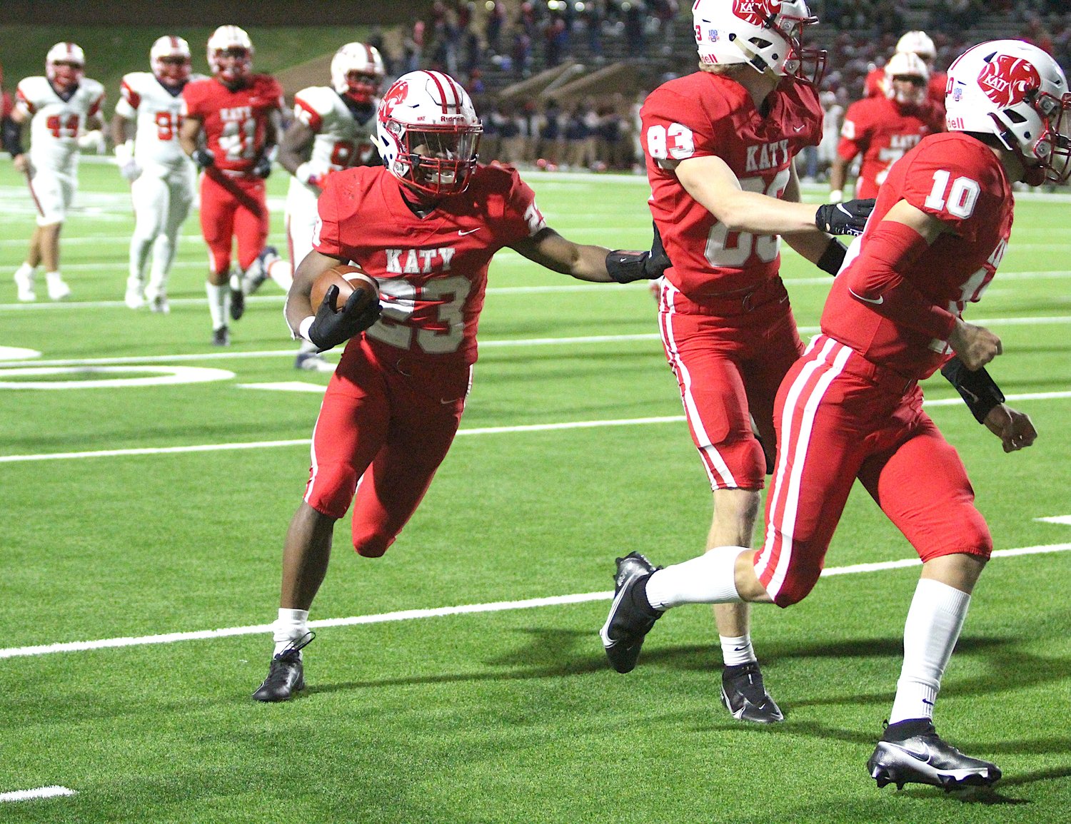 Katy running back Seth Davis runs for one of his two touchdowns during Katy's 6A D2 area playoff win over Lamar at Rhodes Stadium last season.